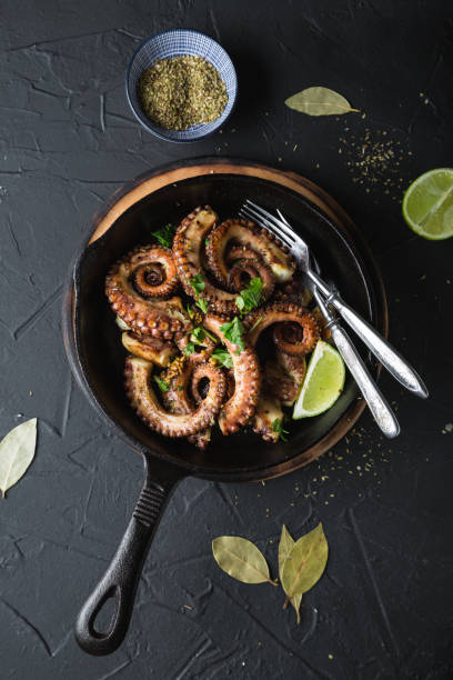 istock Grilled octopus with herbs and lime 1182828787