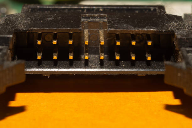 Power socket on motherboard. connector on the circuit board of computer close up. adapter pins macro