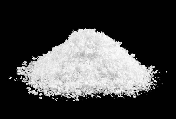 istock A pile of white snow on a black background 1182830450