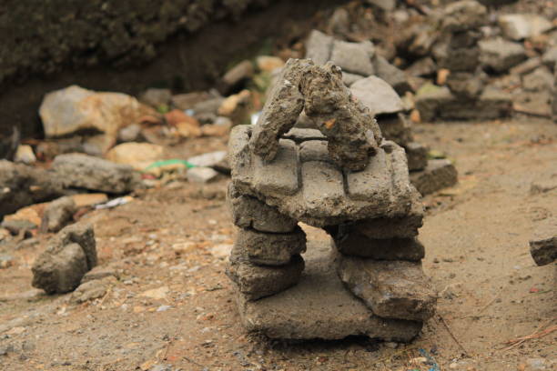 istock Handmade stone object houses on ground 1182831142