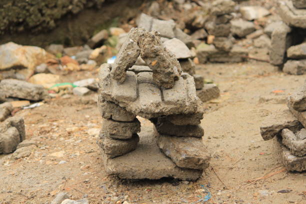 istock Handmade stone object houses on ground 1182831219