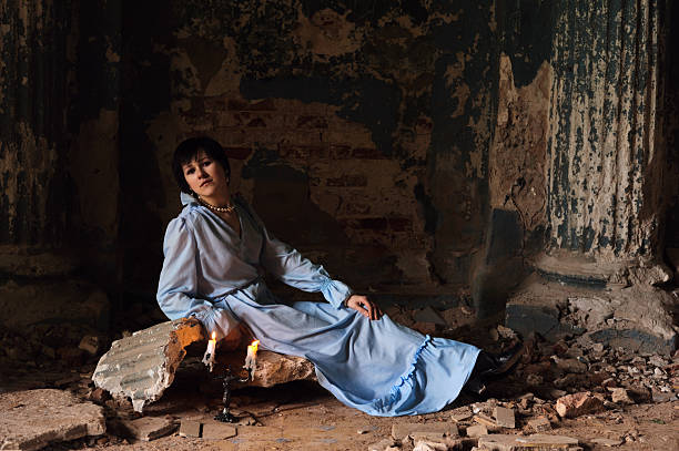 Young woman in ruined building  8564 stock pictures, royalty-free photos & images