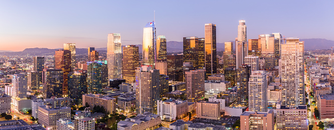 Drone shot of downtown Los Angeles at twilight.