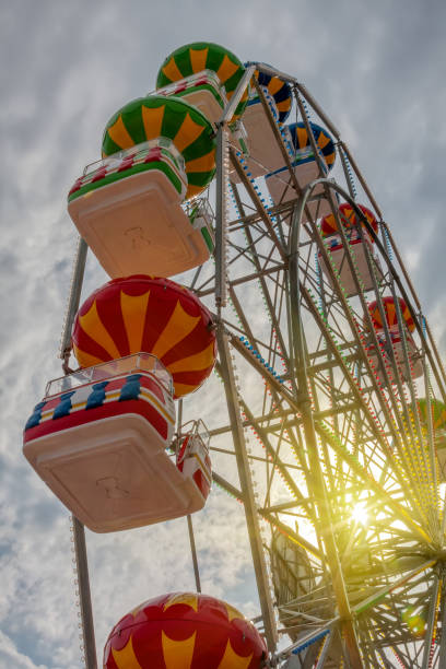 istock Ferris wheel at sunset 1182832295