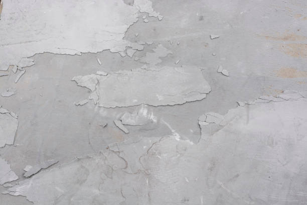 istock Fragment of an old cement wall closeup. 1182832497