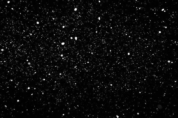 istock Snow isolated on the black background 1182834442