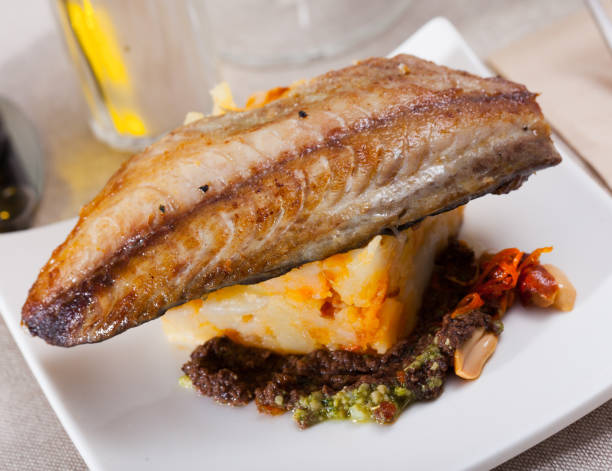 istock Baked mackerel fillet with potatoes 1182834788