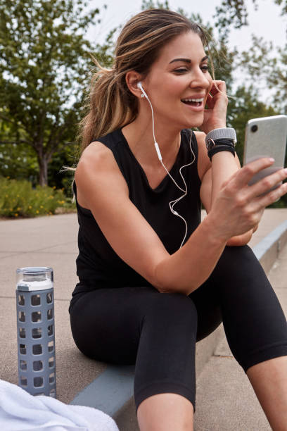 istock Getting guidance from a few fitness apps 1182838778