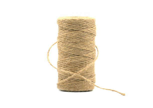 Natural rope, hemp cord isolated on white background.