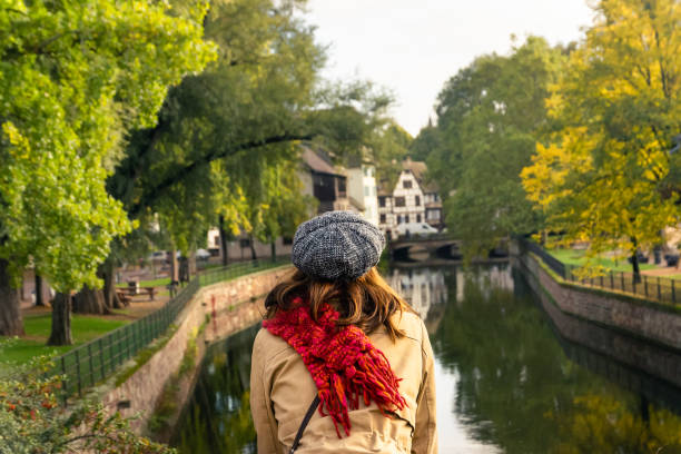 Woman looking to river .