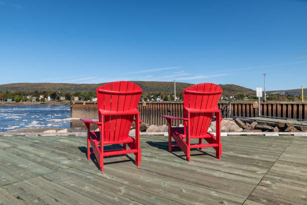 istock Red deck chairs in Annapolis Royal, Canada 1182843845
