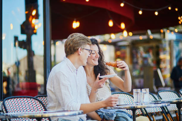 istock Happy romantic couple in Paris, drinking coffee 1182847329