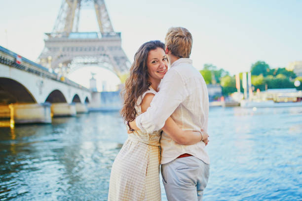 istock Happy romantic couple in Paris, near the Eiffel tower 1182847459