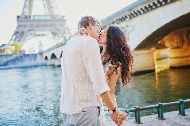 istock Happy romantic couple in Paris, near the Eiffel tower 1182847472