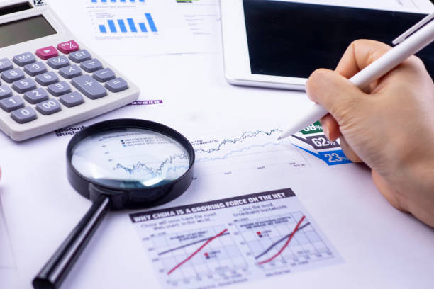 istock Business charts and stationery and tablets on the table 1182849365
