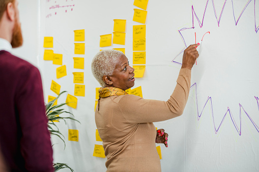 Explaining Her Ideas Stock Photo - Download Image Now - Community ...