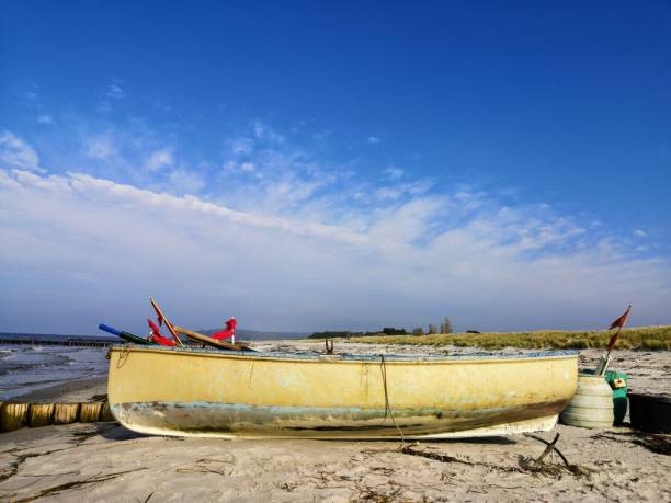 istock Fisherboat with anchor at baltic sea, Germany, Hiddensee 1182852807