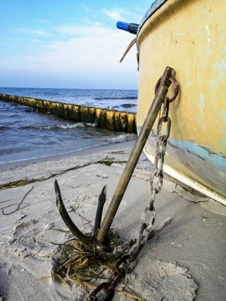 istock Fisherboat with anchor at baltic sea, Germany, Hiddensee 1182852875