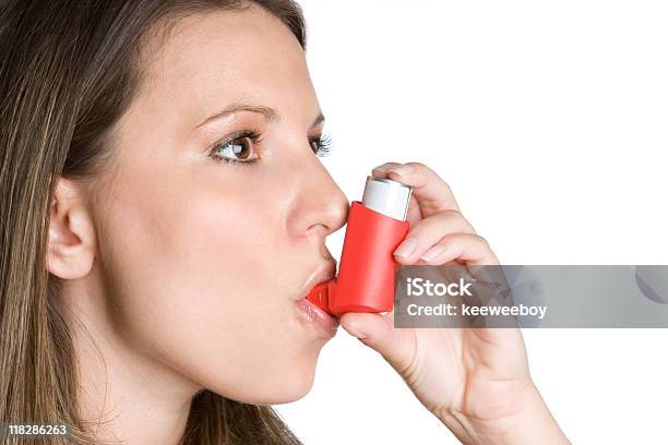 Woman Using Inhaler Stock Photo - Download Image Now - Asthmatic, Teenager, Adult