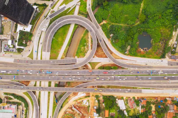 Top down aerial view of Jakarta Outer Ring Road Toll with Depok Antasari toll road interchange in Jakarta city