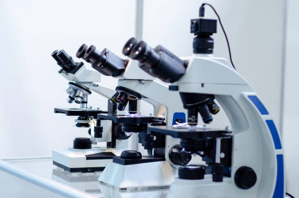 istock Close-up of microscopes at laboratory. 1182863888