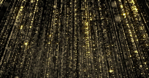 istock Golden glitter and gold particles rain, flowing light threads curtain with bokeh sparks background 1182863917