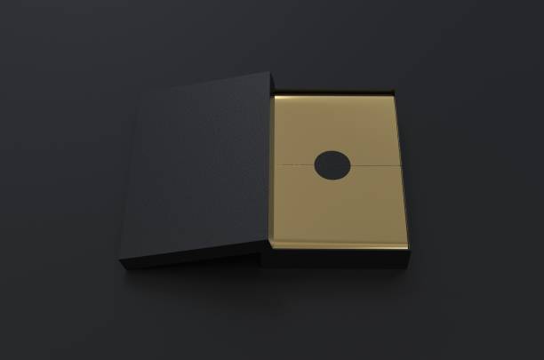istock Black Box with gold wrapping paper and black label sticker, mock up template on black background, 3d illustration 1182864963
