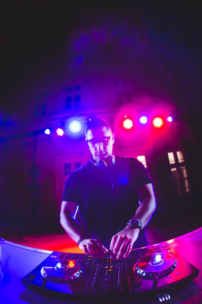 istock DJ playing and mixing music at party 1182870058