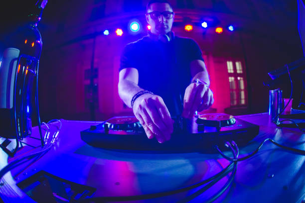 istock DJ playing and mixing music at party 1182870077