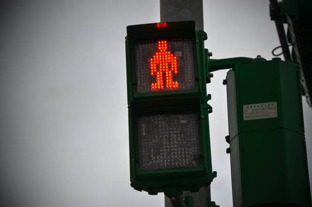 istock Red light pedestrian pedestrian number. 1182872285