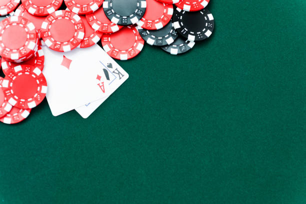 istock Ace and king with poker chips. 1182872291