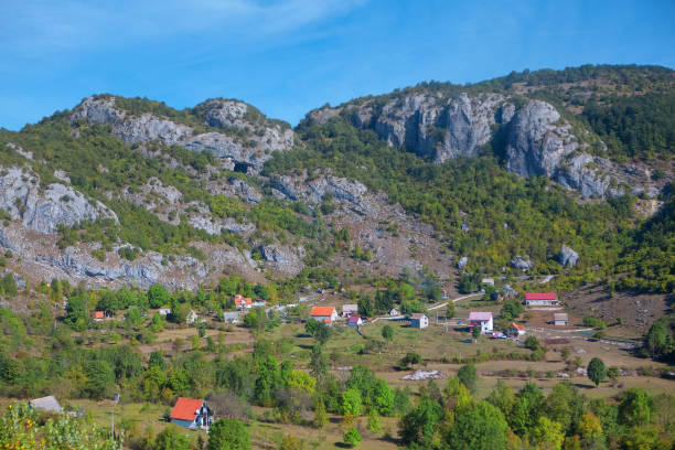 istock village surrounded by mountains 1182872402