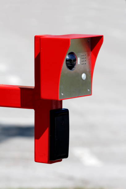 istock Outdoor doorbell camera with two way communication and ID access card reader sensor in metal protective case installed at parking 1182872405