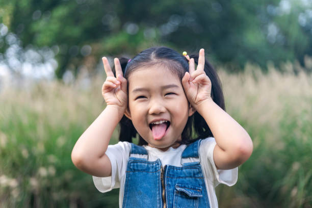 istock Little girl Playing games 1182873464