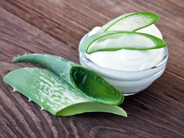 istock Aloe vera cream on wooden background 1182873724