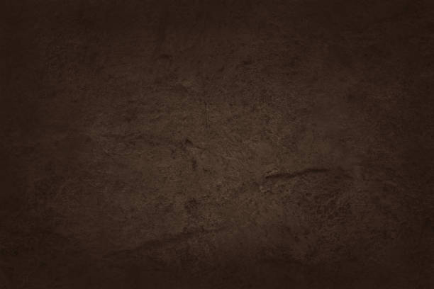 istock Dark brown slate rock texture with high resolution, background of natural stone wall. 1182873765