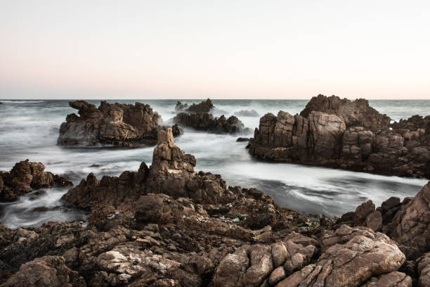 istock Waves an rocks on the coast 1182875489