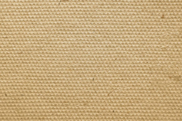 istock Empty brown abstract background. blank for design. Cells of pressed cardboard close-up 1182876654