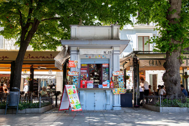 Granada, Spain - May 27, 2019: A small kisok on Bib Rambla Square in the historic city centre.