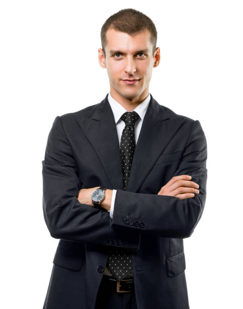 istock Confident businessman looking at camera with arms crossed 1182880392