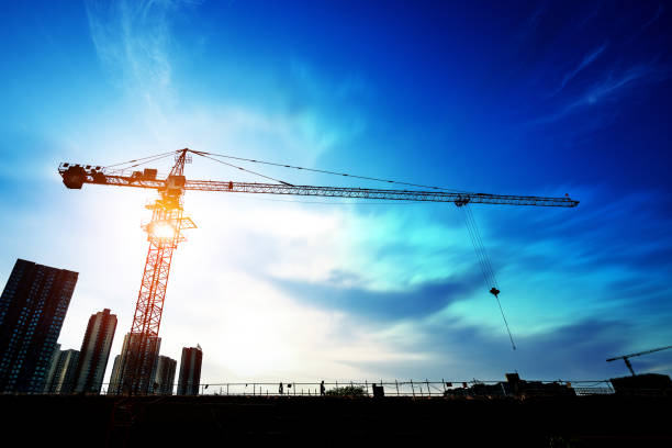 istock Tower cranes, skyscrapers on construction sites 1182881265
