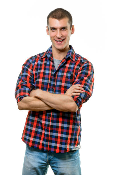 istock Casual young man with arms crossed 1182881486