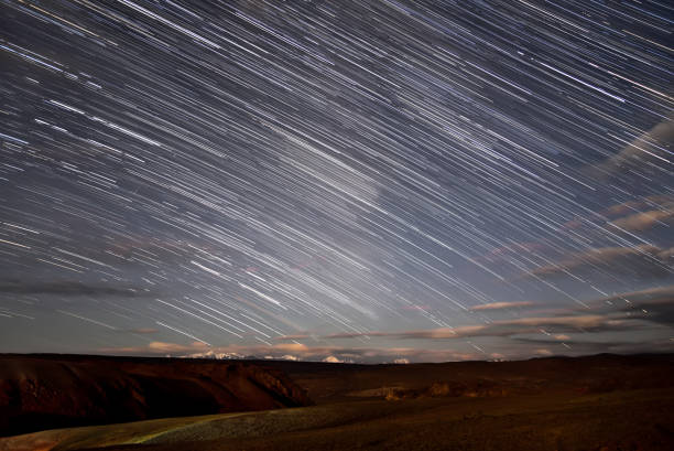 istock stars tracks clouds mountains sky 1182883738