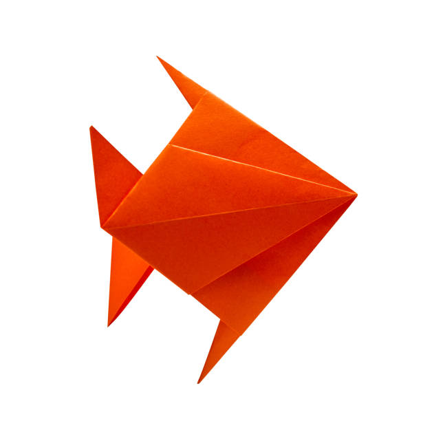Orange fish in Origami isolated on white with clipping path
