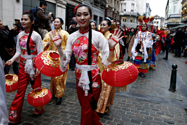 Members of the Chinese community celebrate the Chinese  Lunar New Year . Members of the Chinese community celebrate the Chinese  Lunar New Year of the Rooster in Brussels, Belgium on Jan. 28, 2017 prc stock pictures, royalty-free photos & images