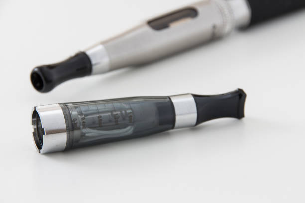 E-cigarette equipment on white background close-up
