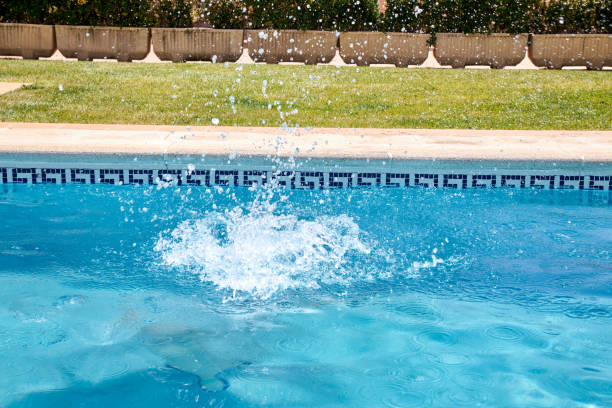 istock woman swimming in a pool 1182892359