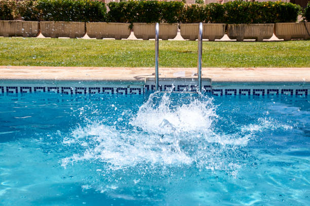 istock woman swimming in a pool 1182892450
