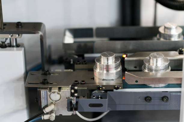 istock Automatic conveyor to transfer CNC turning part with automation control. 1182892494