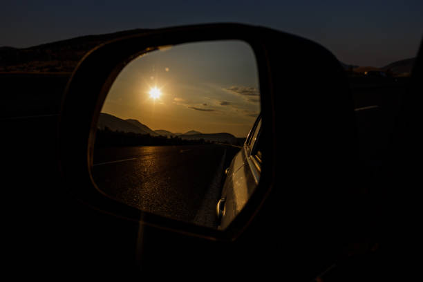 istock View in the side mirror of the car. 1182901159